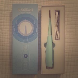 BNIB Ultrasonic Tooth Cleaner